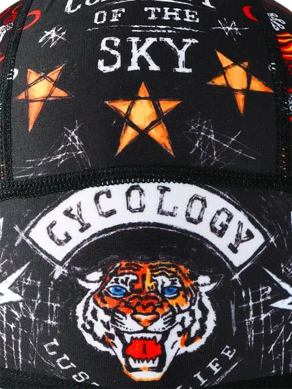 Cycling cap with tiger graphic, stars, and 'Cycology' text on black background for men's and women's bike wear
