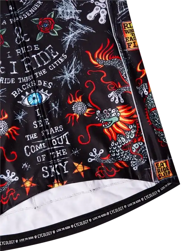 Men's cycling jersey with bold dragon, eye, and flame graphics on black fabric, featuring 'I Ride' text and reflective details.