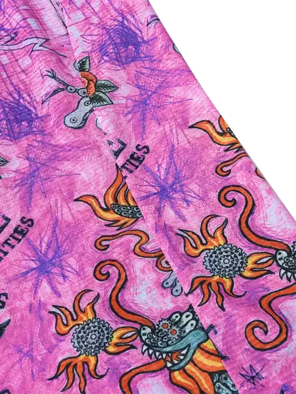 Pink cycling jersey with dragon and floral print, vibrant design for men's or women's bike wear