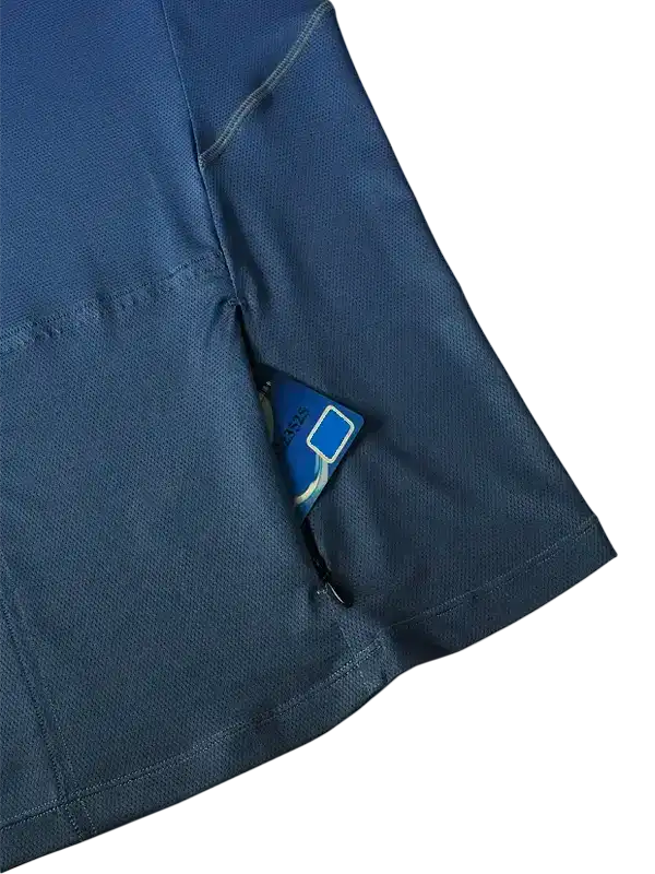 Blue cycling jersey pocket holding card, breathable fabric detail for men's and women's bike wear