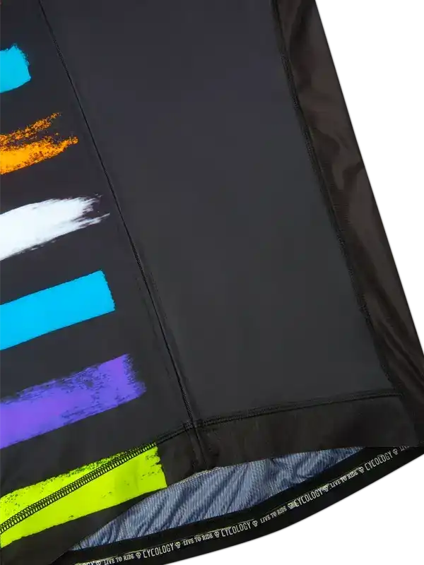 Black cycling jersey with vibrant rainbow brushstroke design, high-quality fabric, and zipper detail