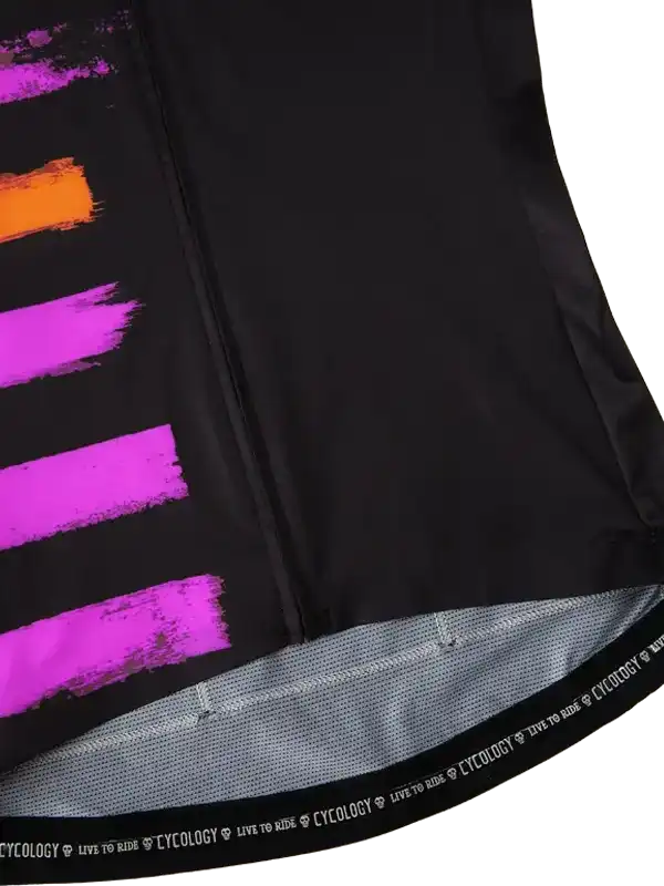 Black cycling jersey with vibrant pink and orange brushstroke design, featuring 'CYCOLOGY LIVE TO RIDE' hem detail.