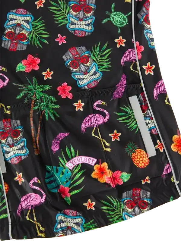 Tropical print cycling shorts with flamingos, palm trees, and skulls on black fabric