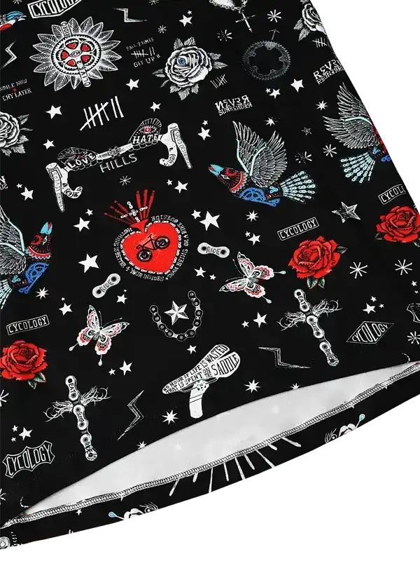Black cycling jersey with edgy tattoo-style print: roses, birds, hearts, stars, and bike parts on dark background