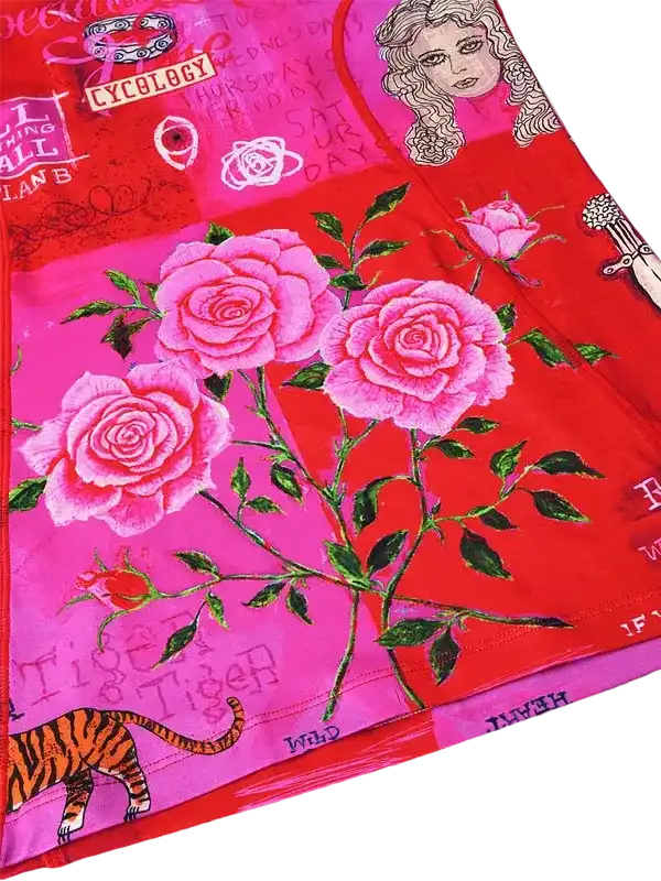 Vibrant red and pink cycling jersey with rose and tiger print, featuring bold graphic designs for women's cycling wear.