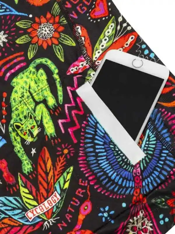 Vibrant floral and animal print cycling shorts with phone pocket, featuring bold colors and nature-inspired design.