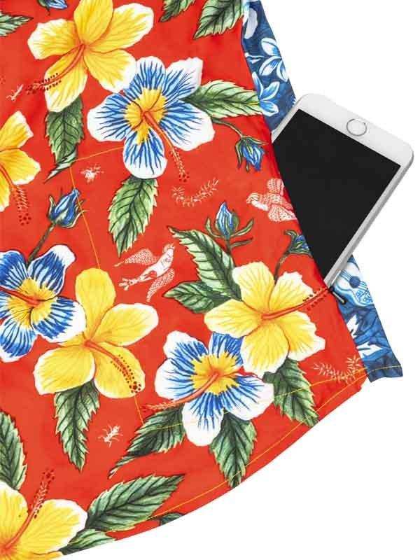 Vibrant red cycling jersey with yellow and blue hibiscus flowers, pocket holding smartphone