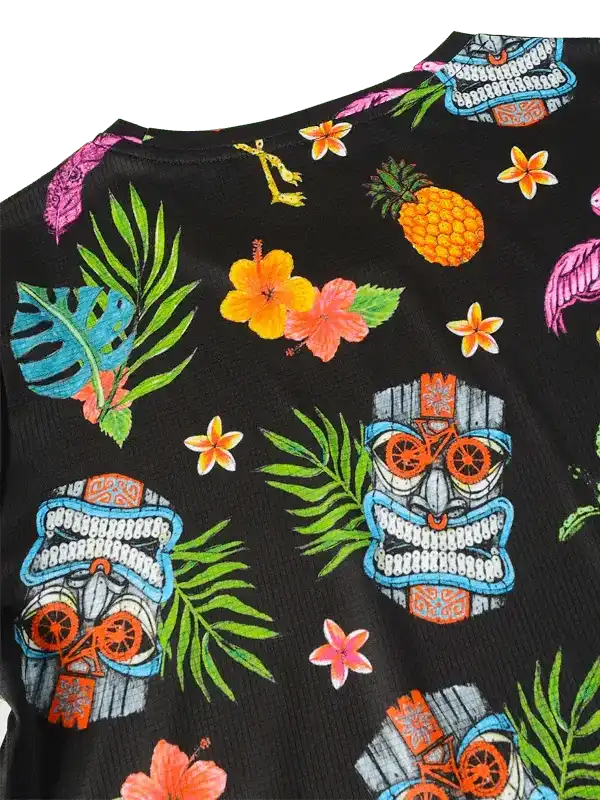 Black tropical cycling jersey with tiki, pineapple, and hibiscus print for men and women