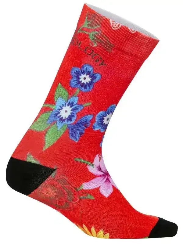 Red cycling sock with blue and pink floral print, black toe and heel, for men or women