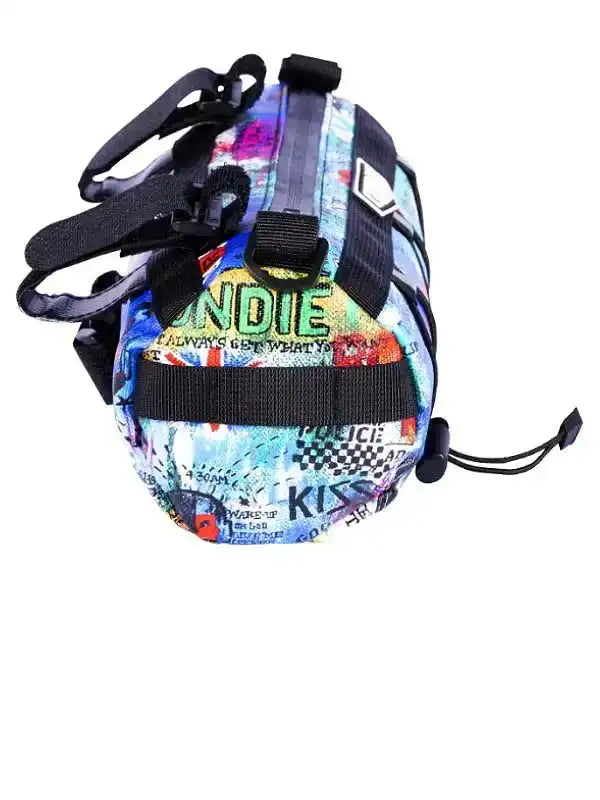 Colorful graffiti-style cycling saddle bag with bold graphics and black straps for bike storage