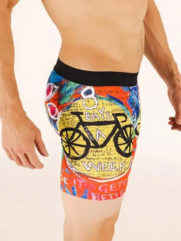Men's cycling shorts with colorful bike graphic and '8 Days a Week' design, ideal for road cycling