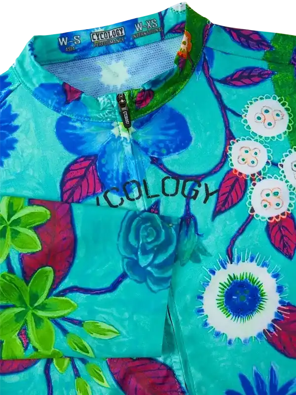 Women's cycling jersey with vibrant floral print, full zip, and performance fabric