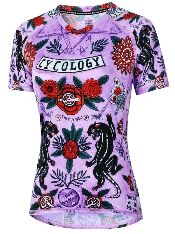Purple women's cycling jersey with floral and panther print, featuring 'Cycology' branding and bold graphics