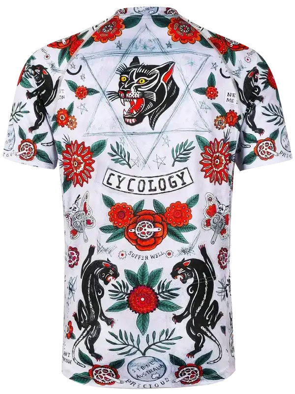Men's cycling jersey with bold panther and floral tattoo-style print, featuring 'CYCOLOGY' text and vibrant red accents.