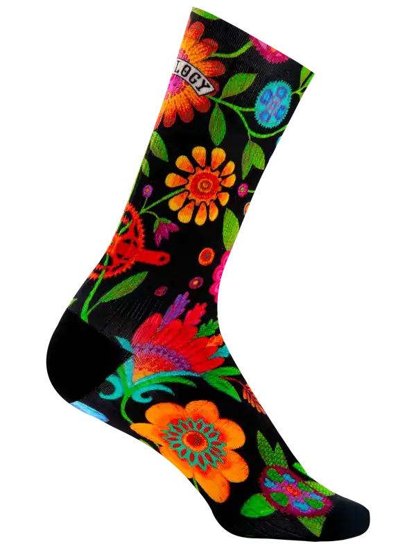 Vibrant floral cycling socks with colorful blooms on black background, perfect for bike rides