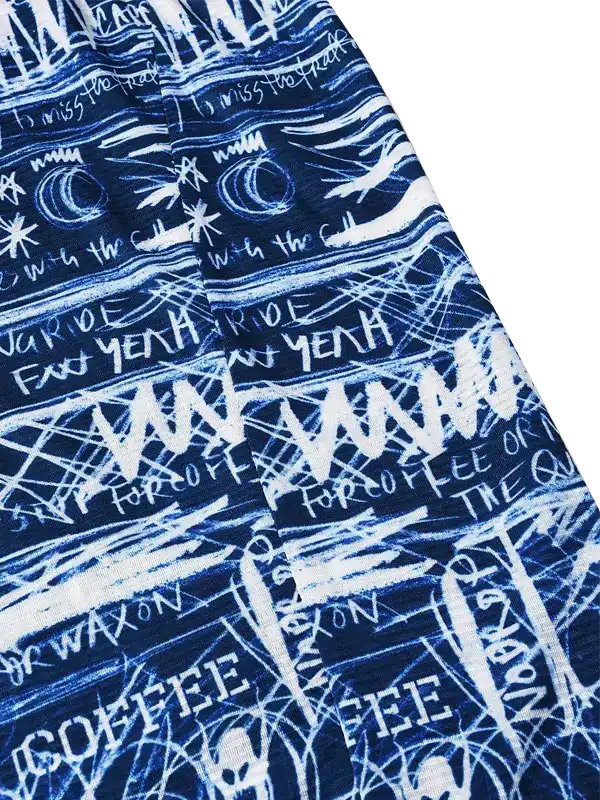Blue cycling jersey with bold white graffiti-style print, featuring phrases like 'RIDE' and 'COFFEE' for urban riders.