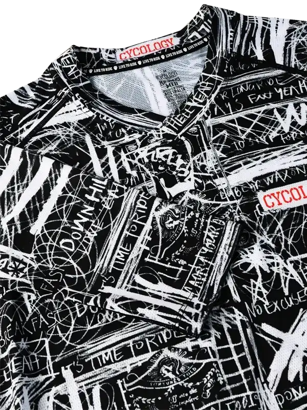 Black and white graffiti-style cycling jersey with bold text and graphics, featuring 'Cycology' branding