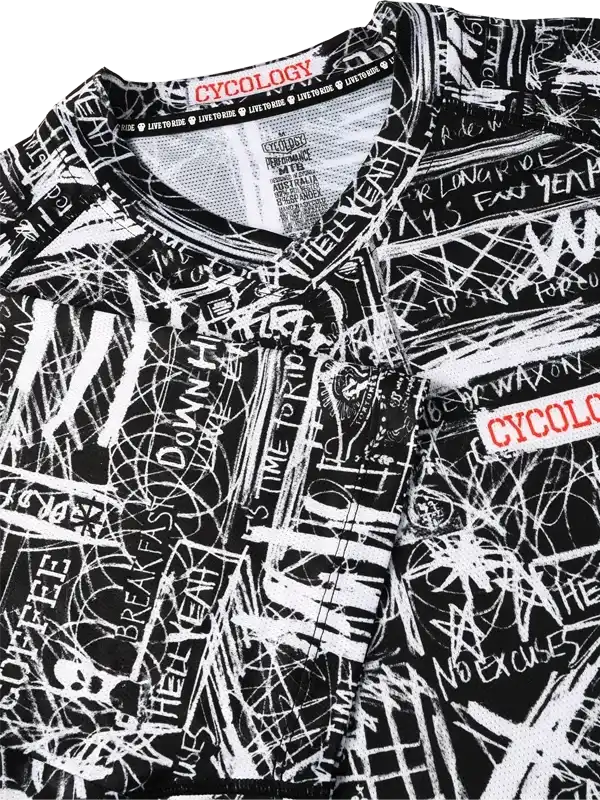 Men's cycling jersey with bold graffiti-style print, featuring motivational phrases and Cycology branding.