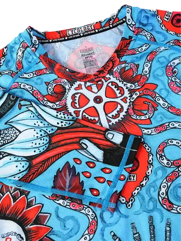 Men's cycling jersey with octopus and gear design, vibrant blue and red print, performance fabric