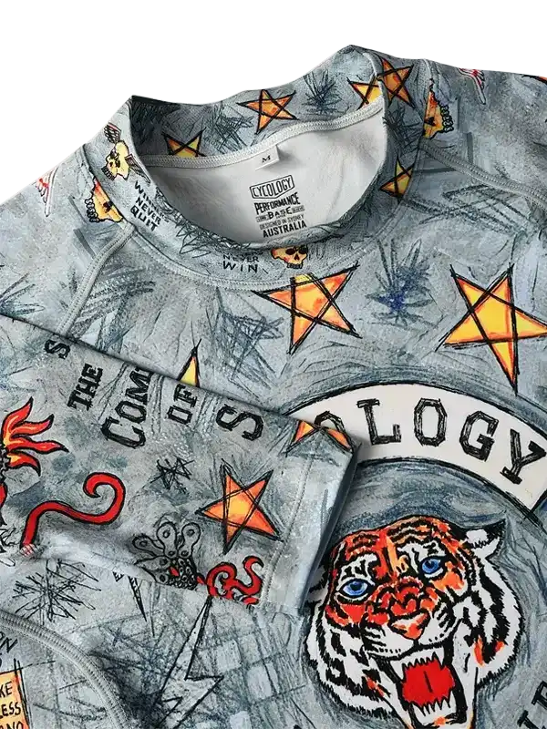 Men's cycling jersey with tiger graphic, stars, and bold typography on gray fabric