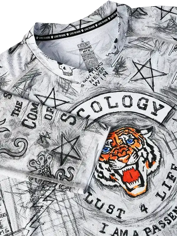 Men's cycling jersey with bold tiger graphic, pentagrams, and 'Cycology' text on gray fabric