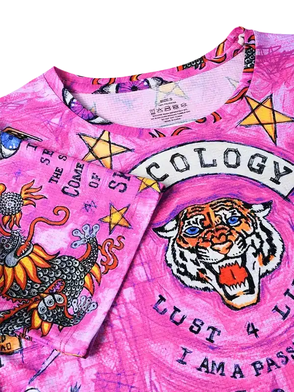 Pink cycling jersey with tiger graphic, stars, and bold text design for men and women