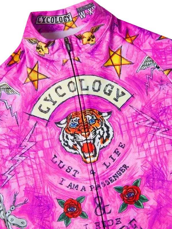 Vibrant pink cycling jersey with tiger, roses, stars, and 'Cycology' branding for men's and women's bike wear