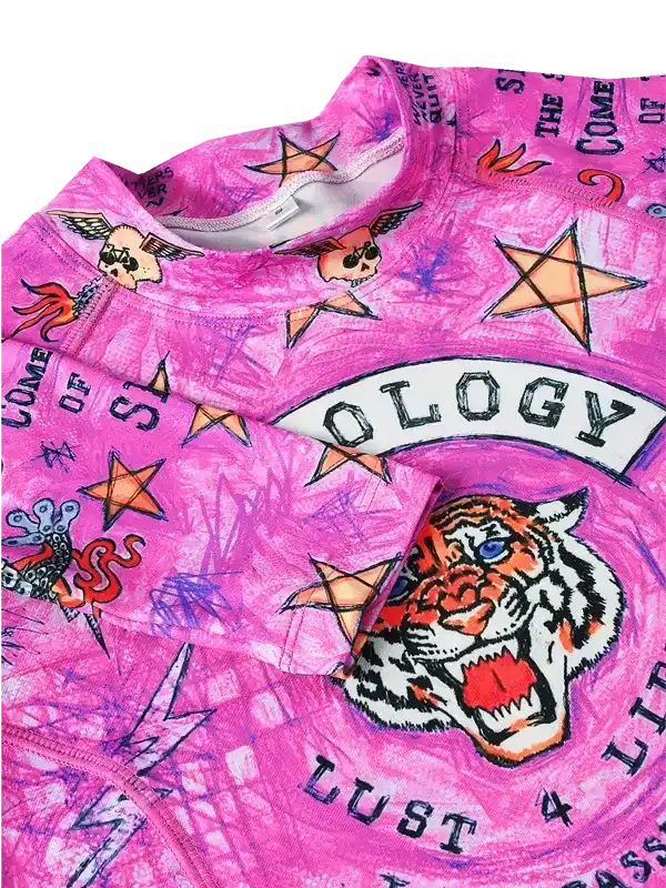Pink cycling jersey with tiger, stars, and bold graphics for men and women