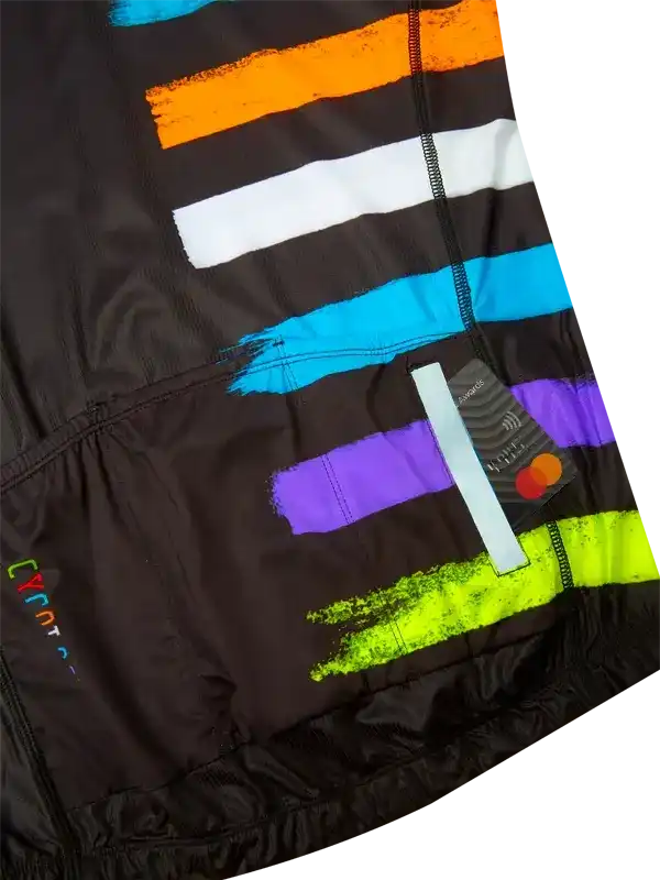 Black cycling jersey with bold colorful brushstroke stripes, featuring back pockets and zipper detail
