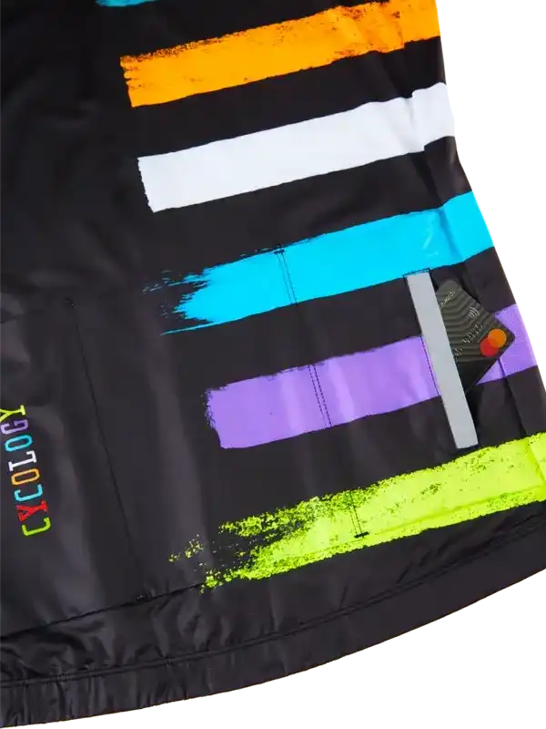 Black cycling jersey with bold colorful brushstroke stripes and side pocket for essentials