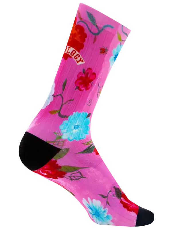 Pink floral cycling socks with black toe and heel, vibrant red and blue flowers, stylish bike wear