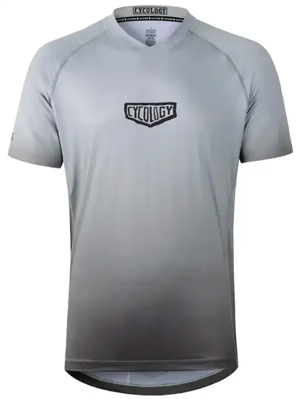 Men's grey gradient cycling jersey with Cycology logo, short sleeve bike shirt for road cycling