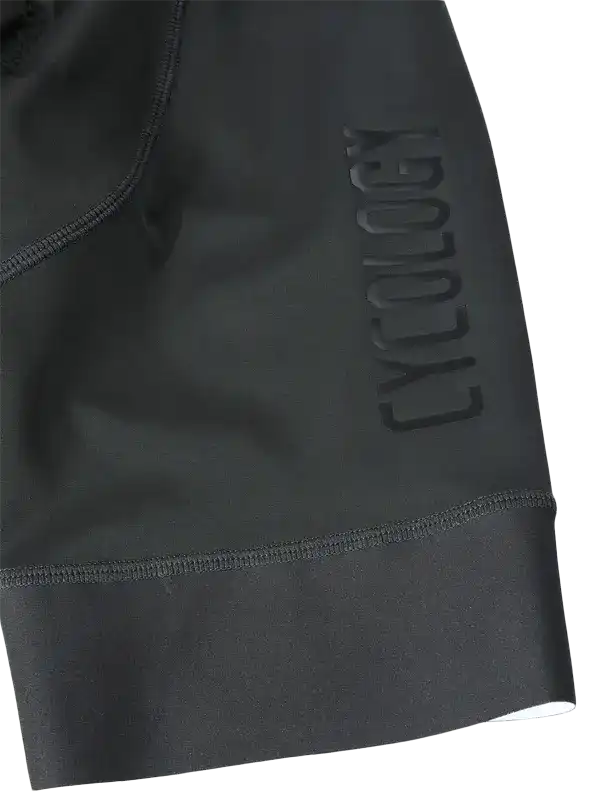 Black cycling shorts with embossed Cycology logo, high-quality fabric, seamless stitching for comfort