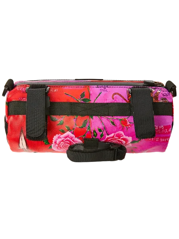 Vibrant pink and red floral cycling frame bag with black straps for bike storage