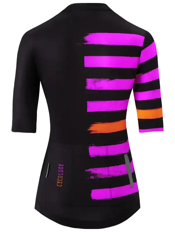 Women's cycling jersey with bold pink and orange brushstroke stripes on black, 3/4 sleeves, rear pockets