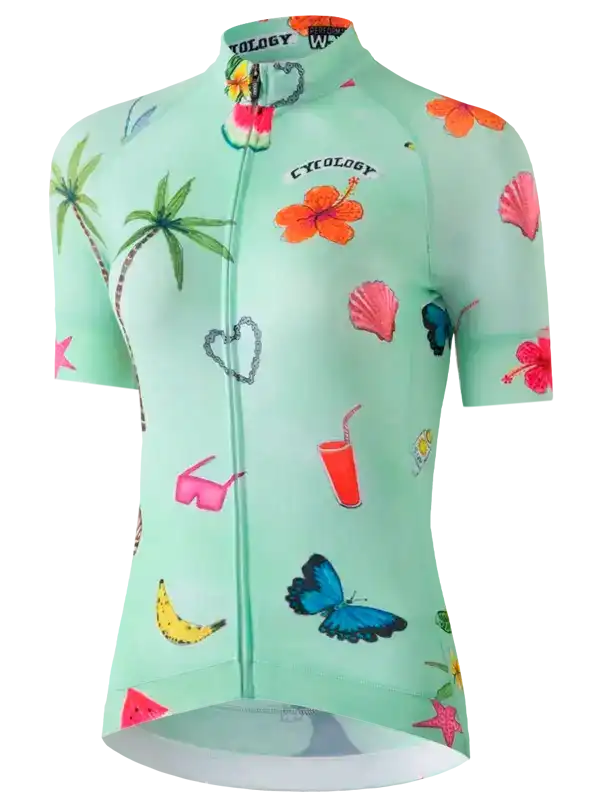 Women's tropical print cycling jersey with palm trees, hibiscus, and butterflies on mint green fabric