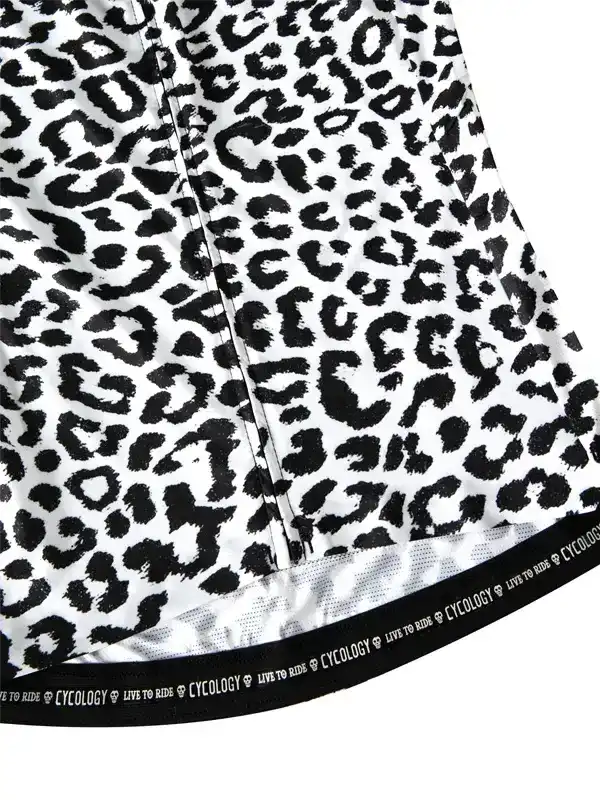 Women's cycling jersey with bold black and white leopard print, featuring 'CYCOLOGY LIVE TO RIDE' hem detail