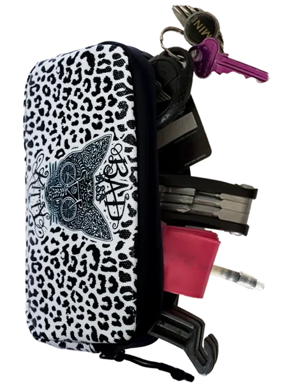 Leopard print key organizer with cat design, holding keys and tools