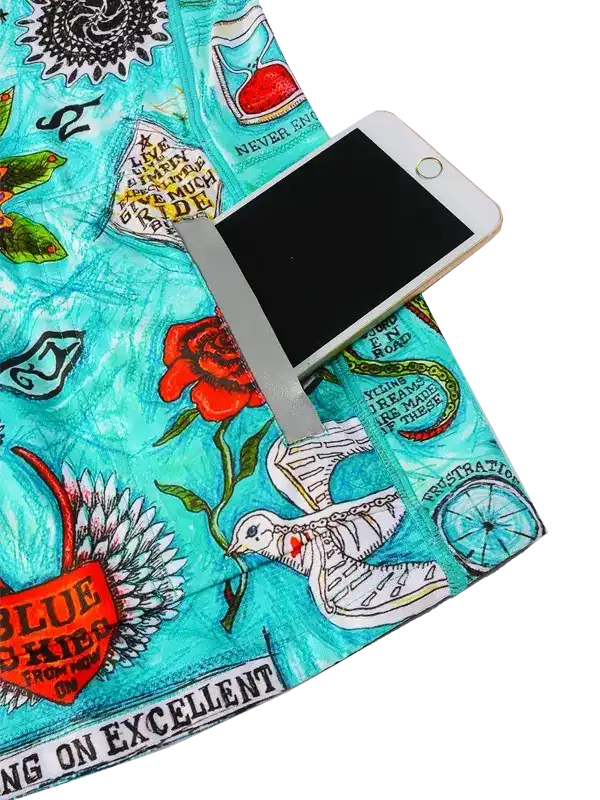Cycling jersey with vibrant turquoise print, floral and graphic designs, phone pocket detail