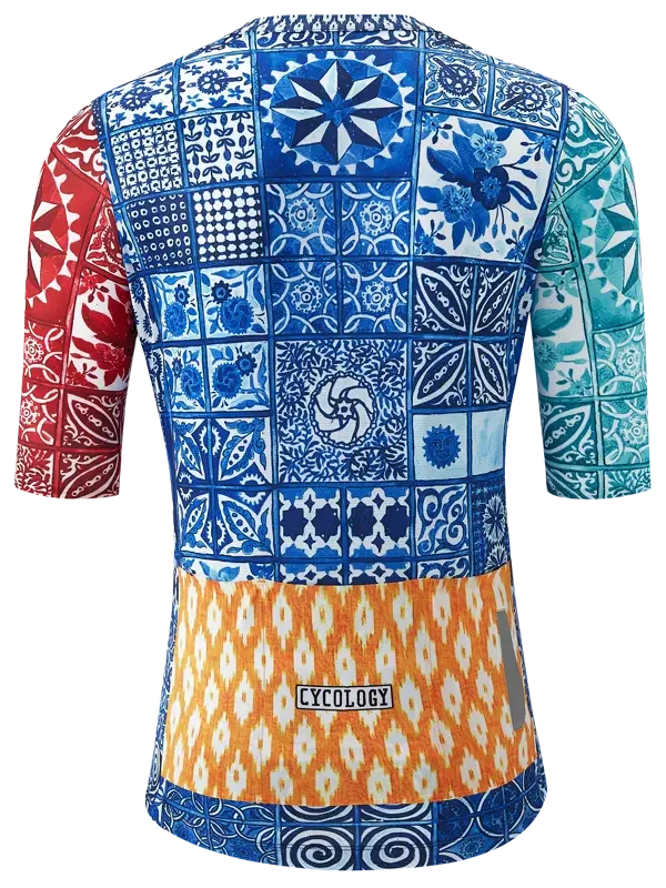 Men's cycling jersey with vibrant blue, red, and orange tile-pattern design, featuring 'CYCOLOGY' logo on back.
