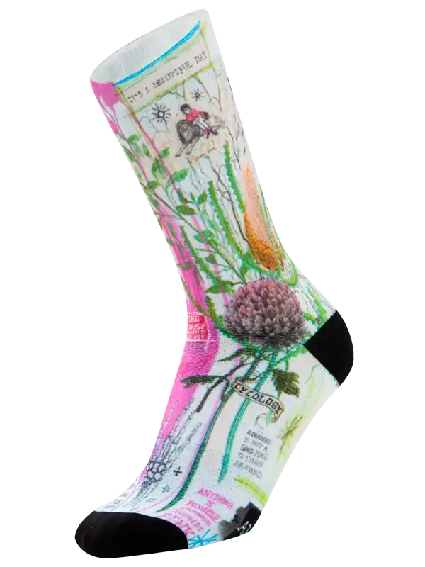 Colorful cycling sock with floral and vintage cycling graphics, perfect for bike rides and outdoor adventures.