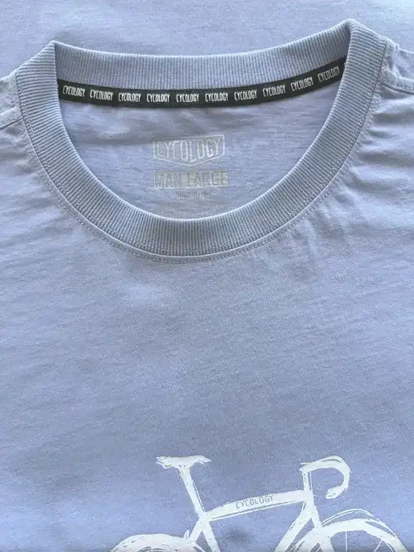 Light blue men's cycling t-shirt with white bike graphic and Cycology brand tag