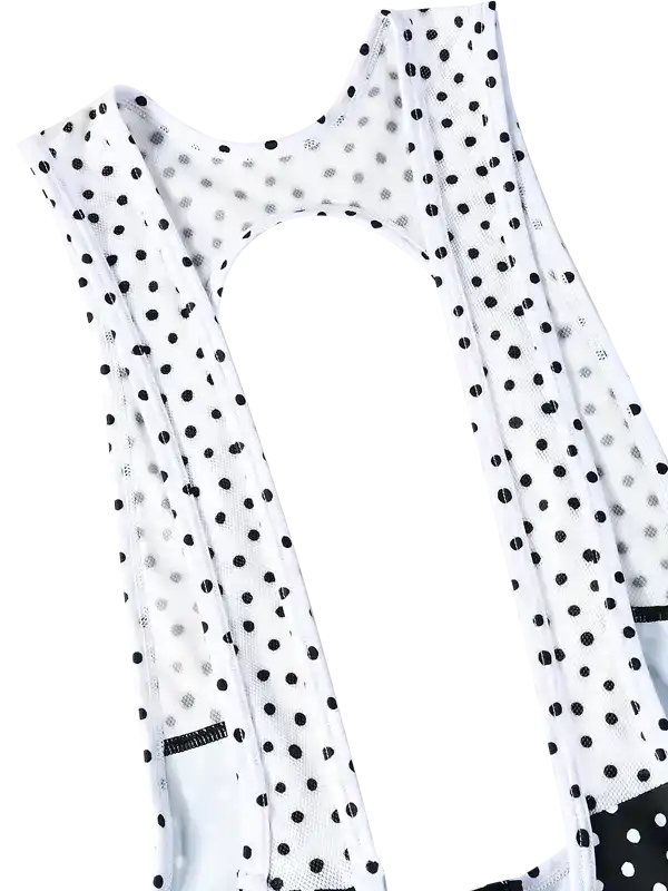 Women's cycling jersey with black polka dots on white mesh fabric, breathable design for performance