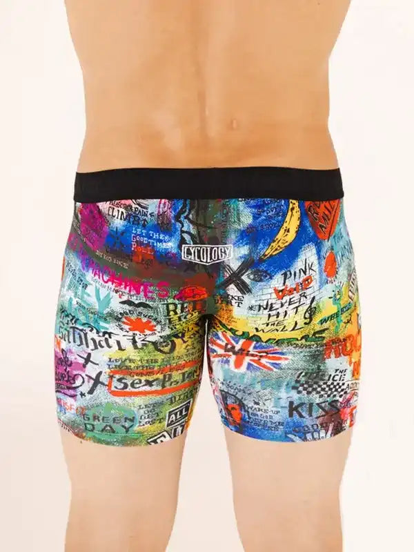 Men's colorful graffiti-print cycling shorts with black waistband, featuring band names and rock art design
