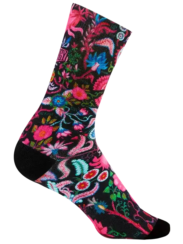 Vibrant floral cycling socks with pink, blue, and green patterns on black background for men and women