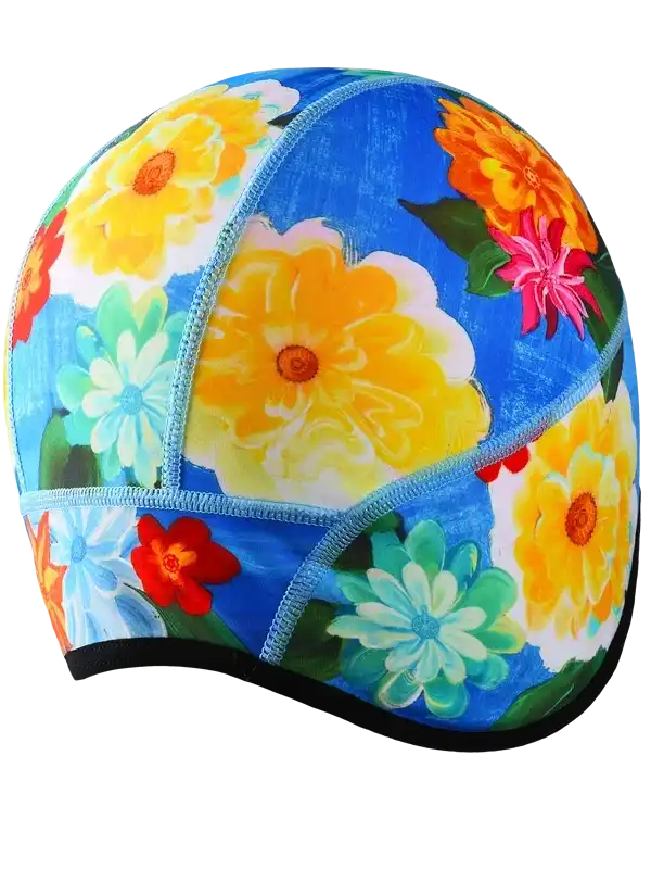 Colorful floral cycling cap with vibrant yellow, pink, and blue flowers on blue background