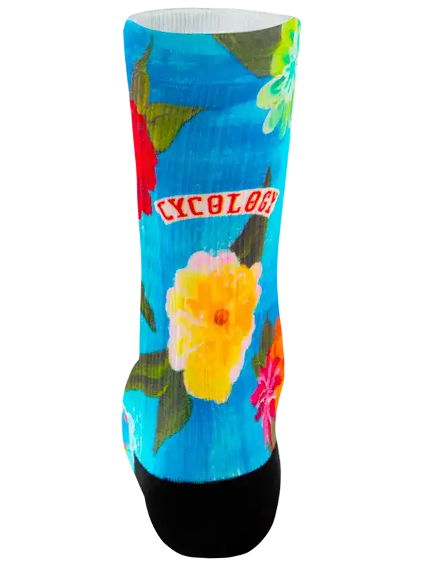 Blue cycling sock with floral print and 'CYCOLOGY' logo, ideal for men's and women's bike rides.
