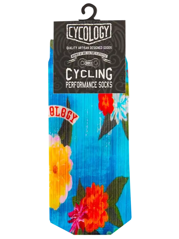 Cycling performance socks with vibrant floral print on blue background, ideal for bike culture enthusiasts.