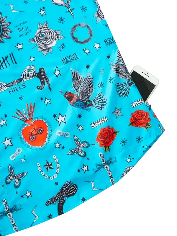 Vibrant blue cycling jersey with tattoo-style roses, birds, stars, and bike graphics, featuring phone pocket