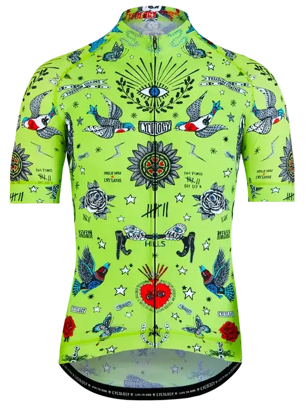 Vibrant green men's cycling jersey with tattoo-style birds, roses, and eye motifs, featuring full zip and reflective details.